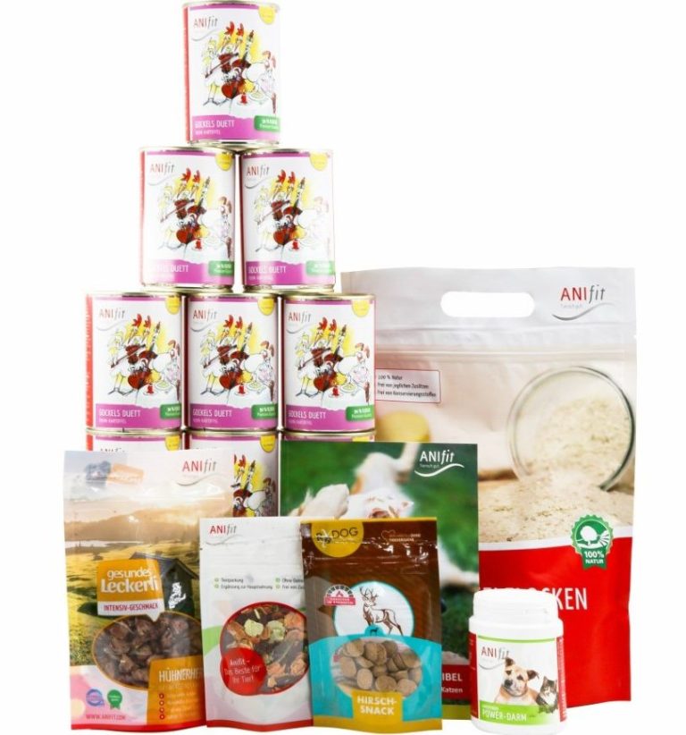 ANIfit Futterumstellungspaket mittel für Hunde Eine Auswahl an ANifit-Produkten zur Futterumstellung, darunter Dosen, Flocken, Snacks und Supplements.
